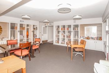 a clubhouse with shelves and chairs